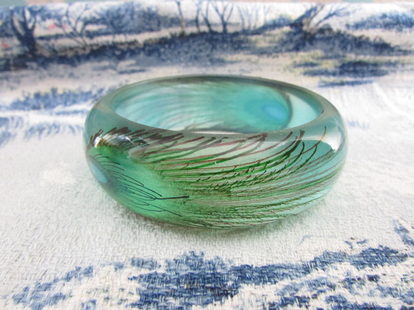 Vintage resin peacock feather bangle