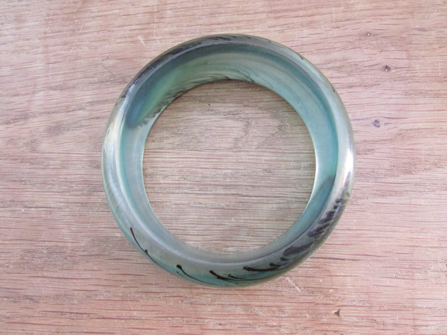 Vintage resin peacock feather bangle