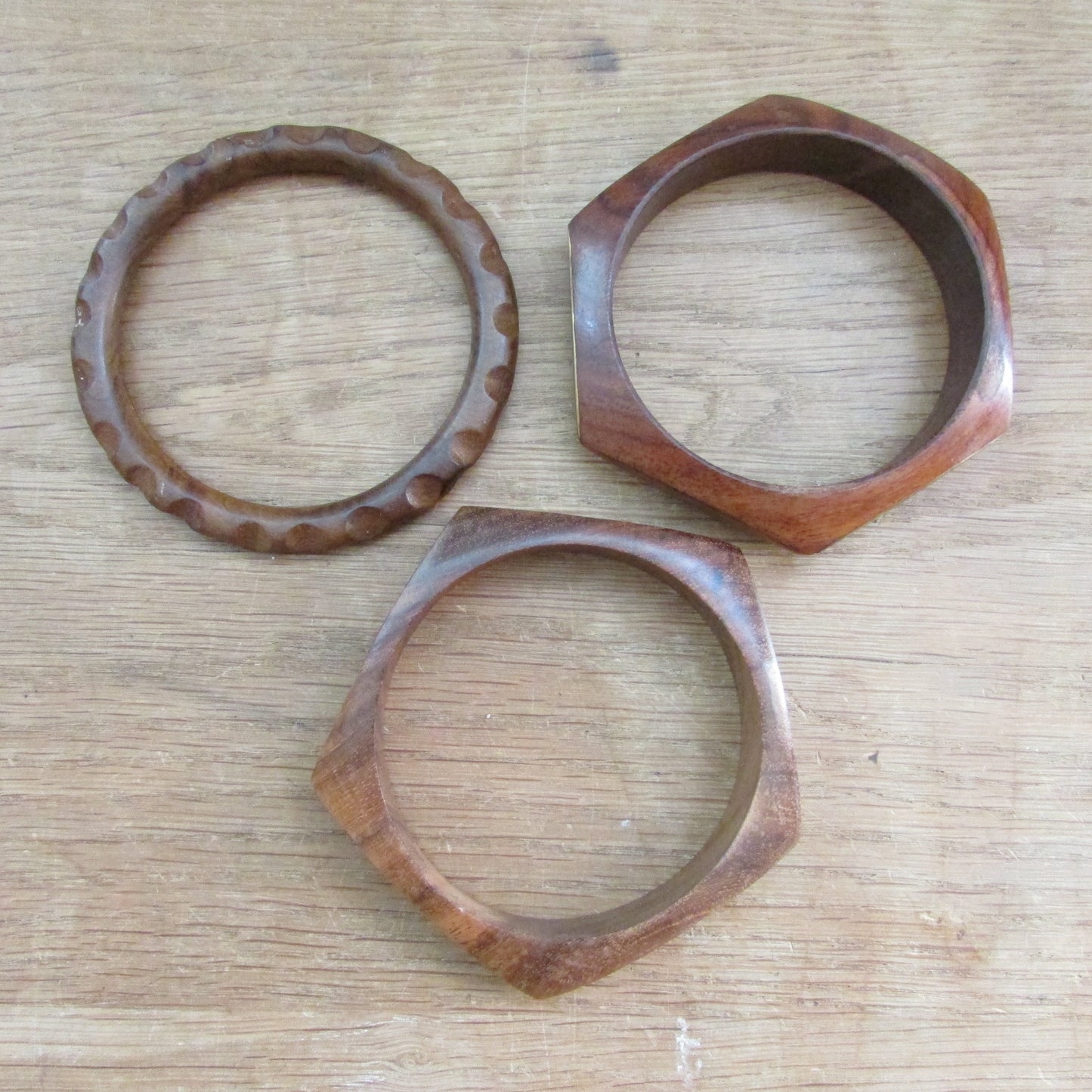 Set of three 1970s hand carved wooden bangles