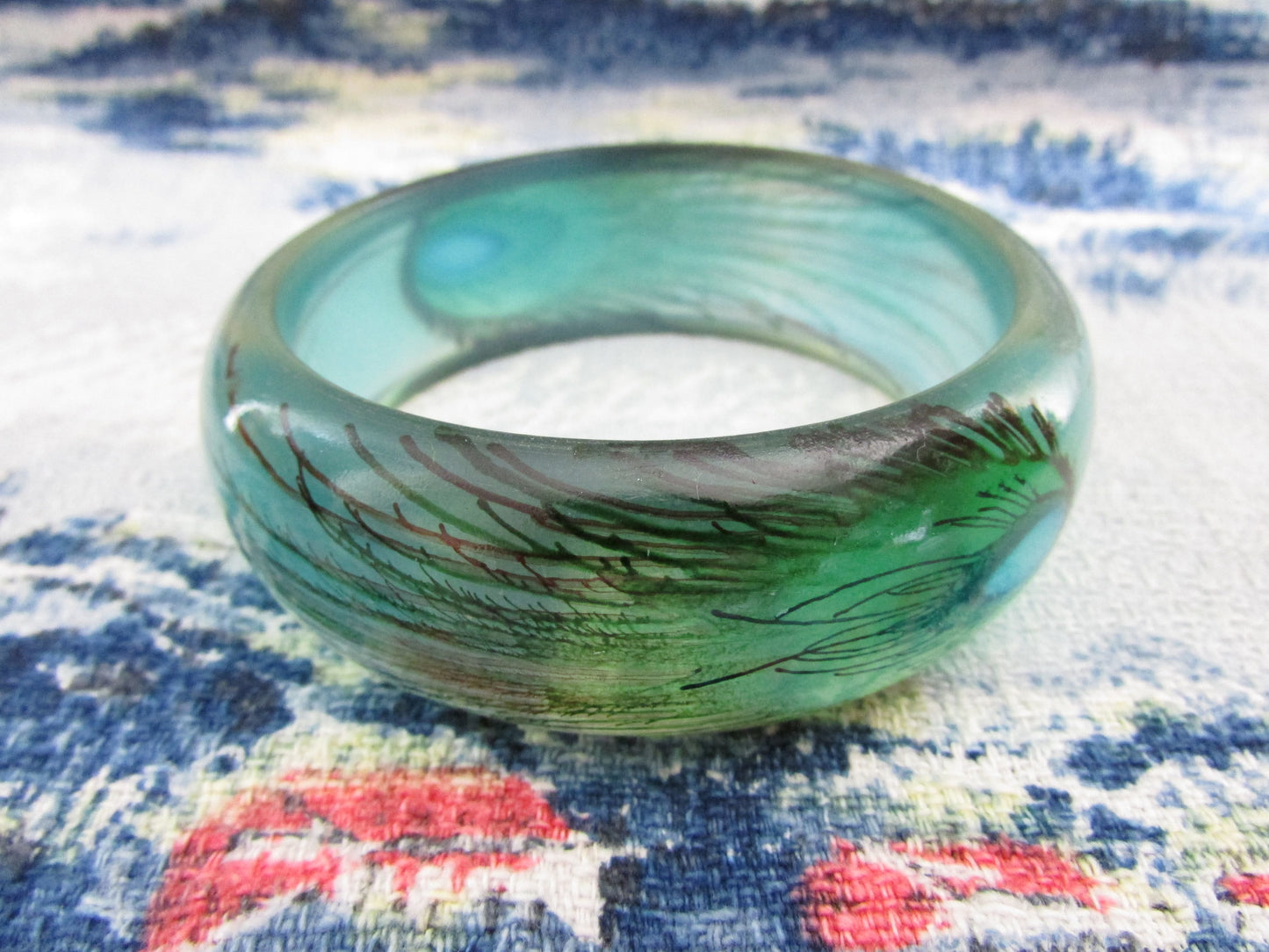 Vintage resin peacock feather bangle