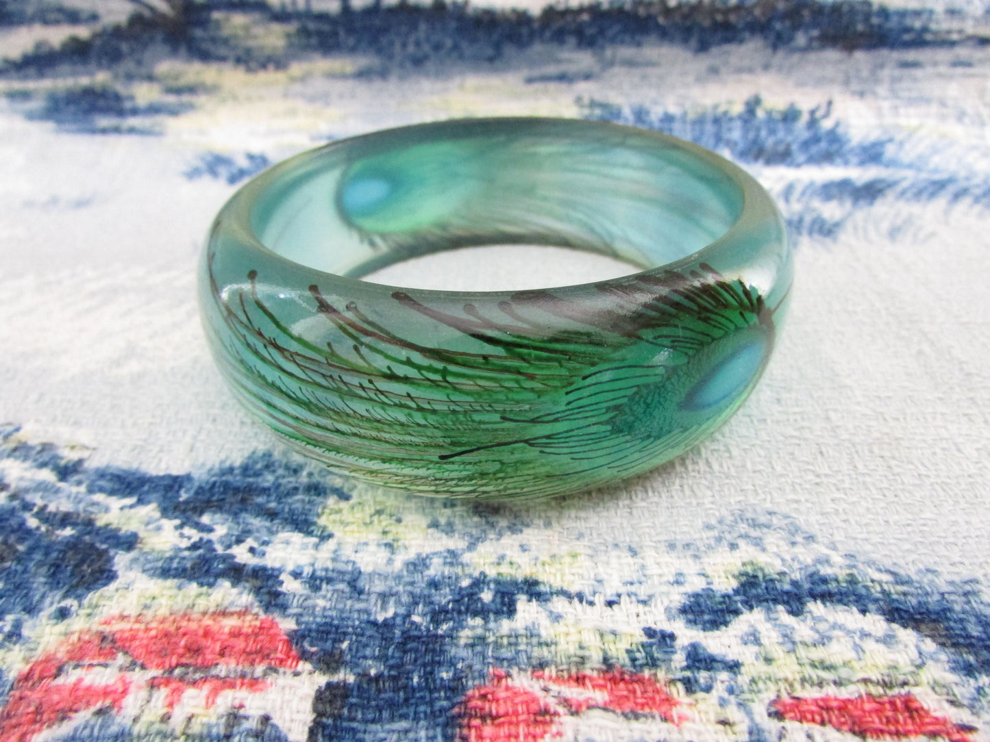 Vintage resin peacock feather bangle