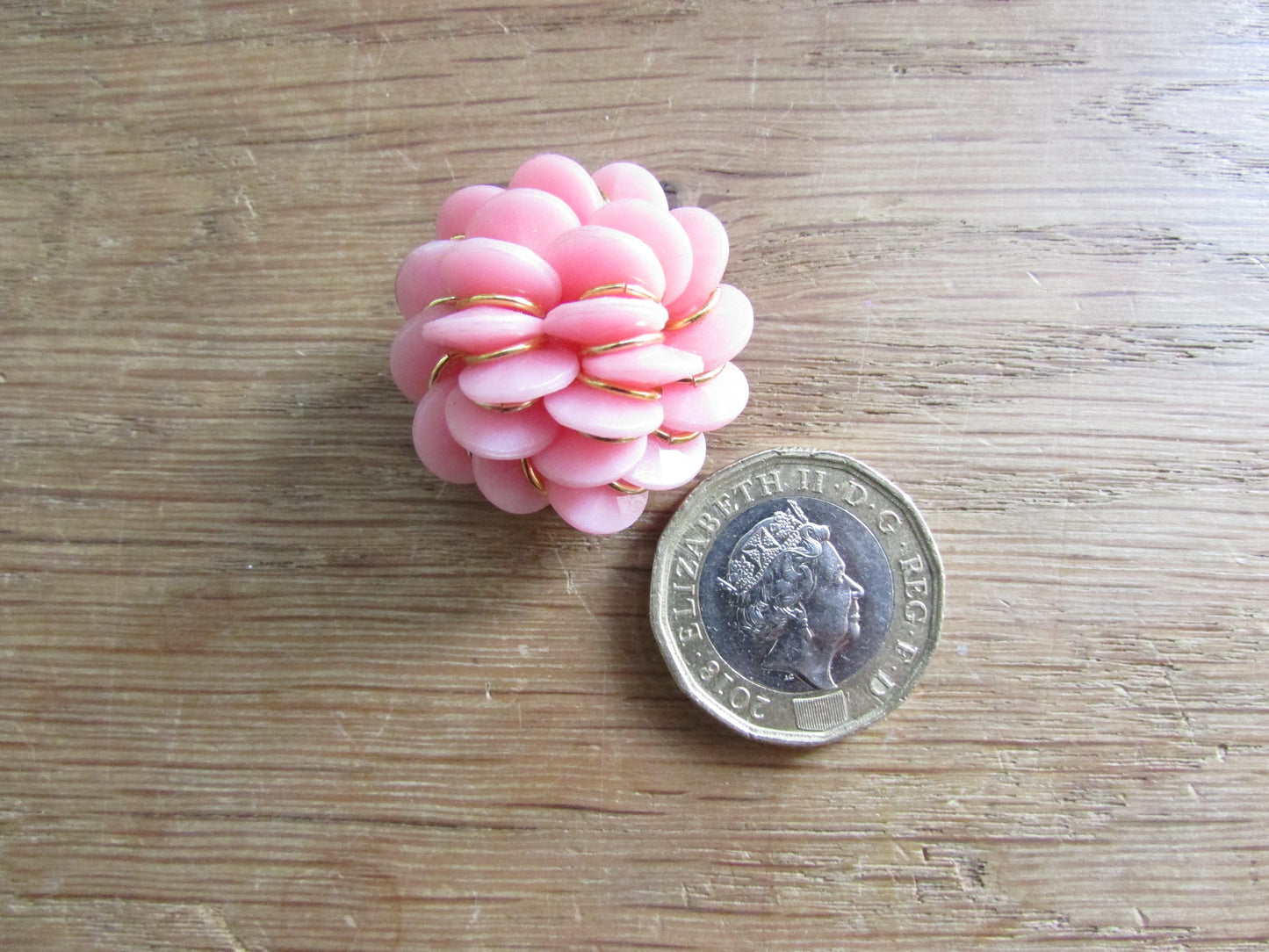 1960s pink plastic cluster flower clip-on earrings with gold-tone accents