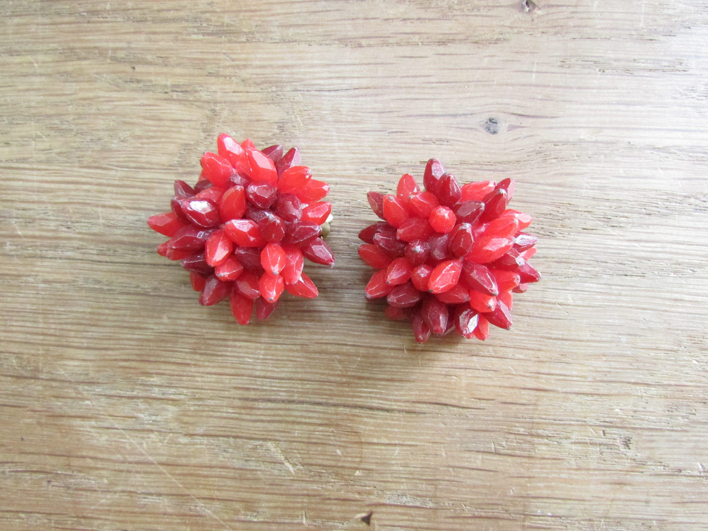 1950s red/cranberry plastic cluster faceted bead flower clip-on earrings