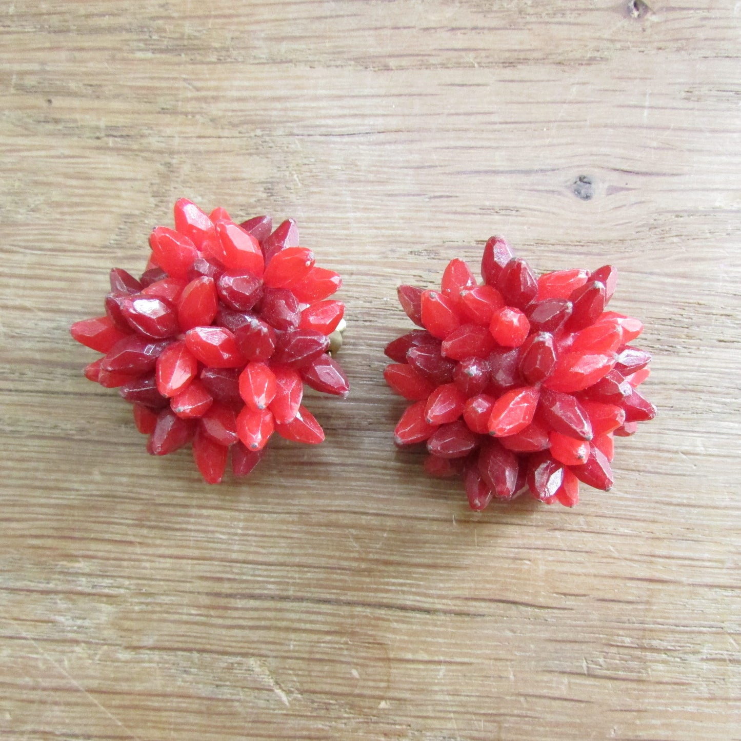 1950s cranberry red faceted plastic flower cluster clip-on earrings