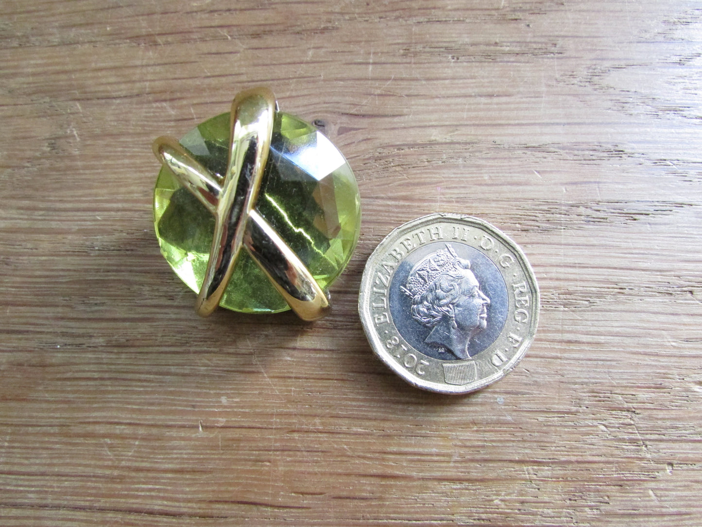 1980s plastic citrine cabochon with gold-tone crossover clip-on earrings