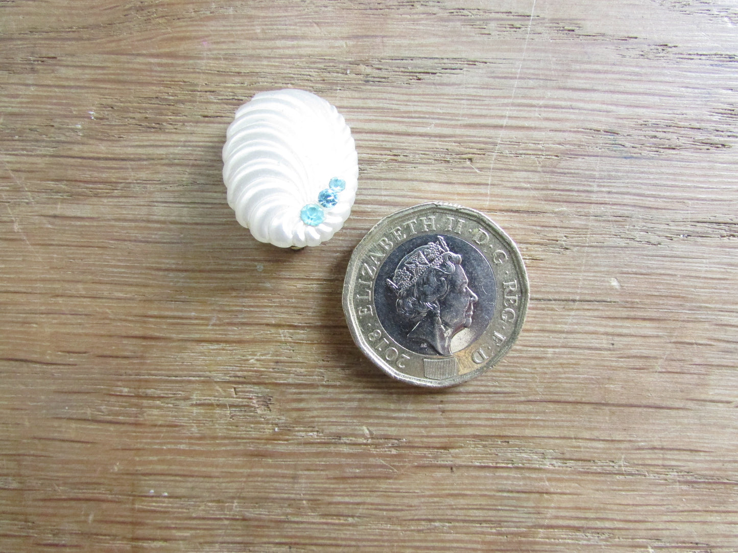Small vintage white plastic scallop ribbed clip-on earrings with diamante detail