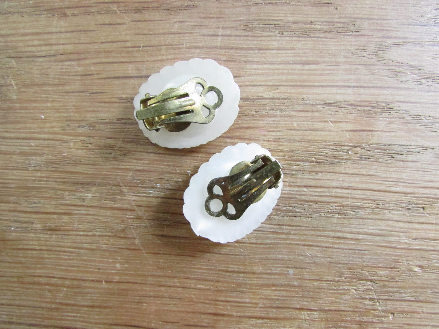 Small vintage white plastic scallop ribbed clip-on earrings with diamante detail