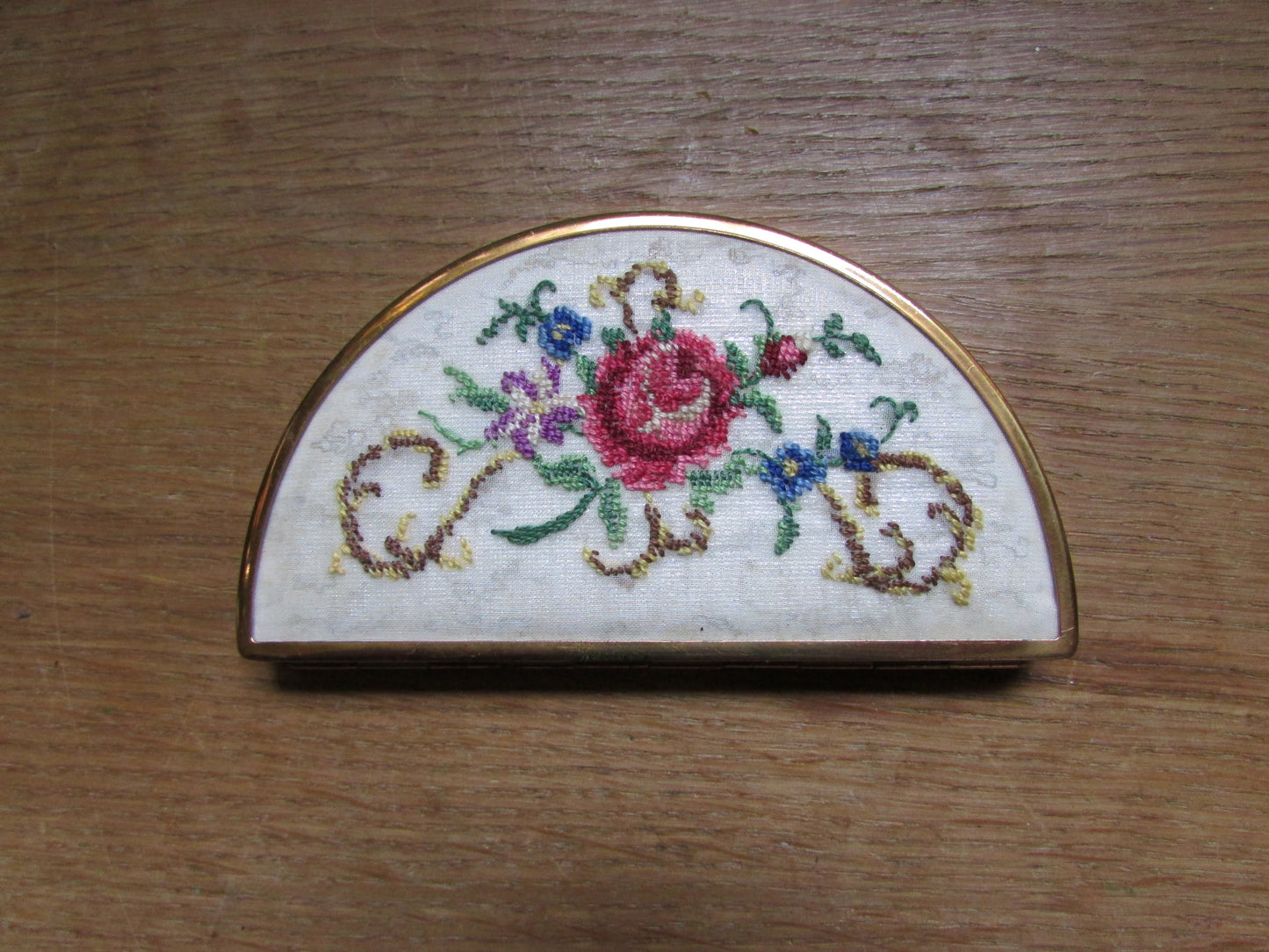 Unusual vintage needlepoint/petit point gold-tone half moon/crescent compact (empty)