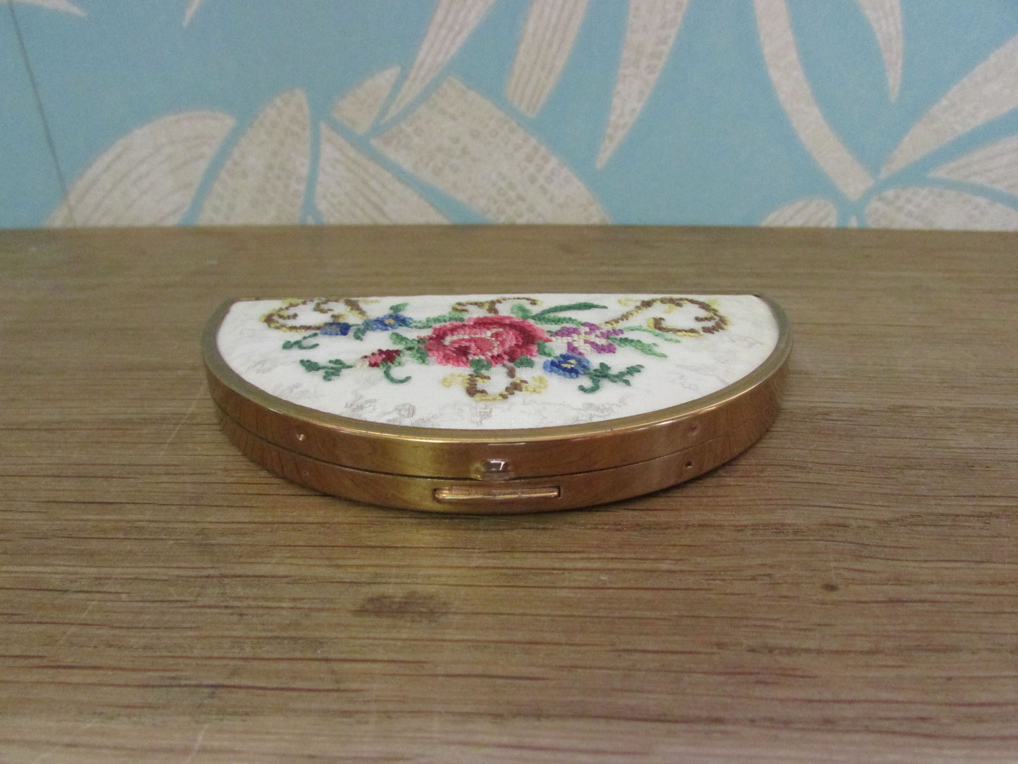 Unusual vintage needlepoint/petit point gold-tone half moon/crescent compact (empty)