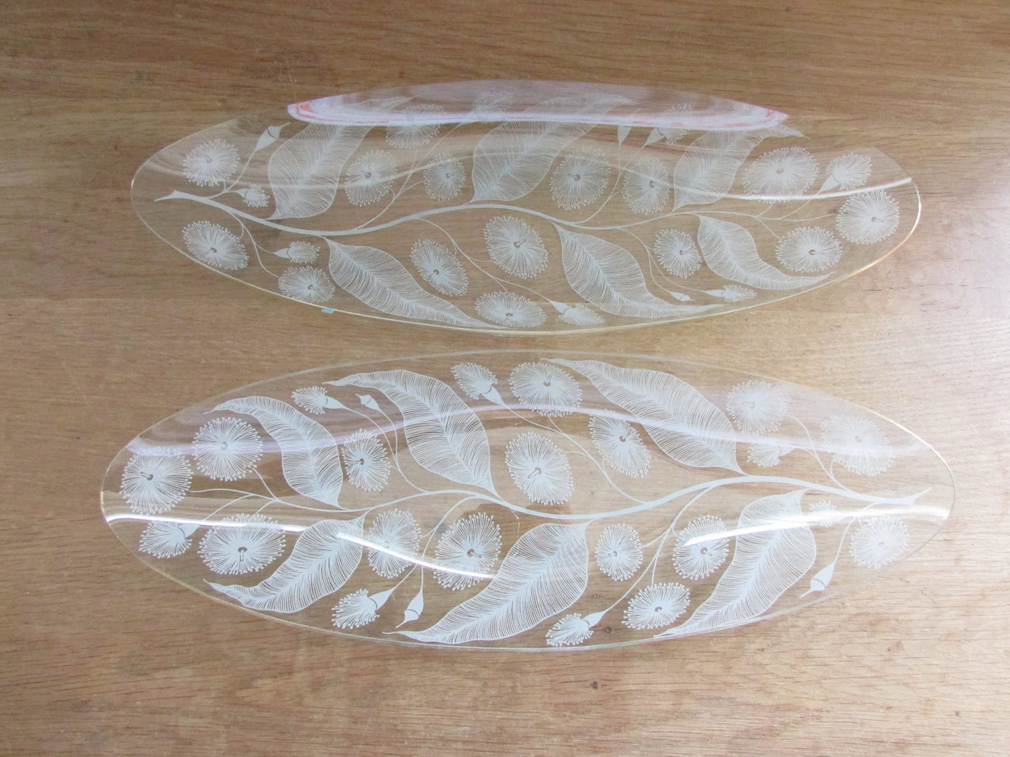 Pair of late 1950s Michael Harris for Chance Glass 'Calypto' longboat dishes