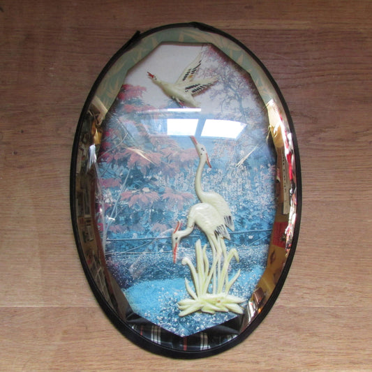 Vintage kitsch oriental domed wall diorama featuring plastic storks
