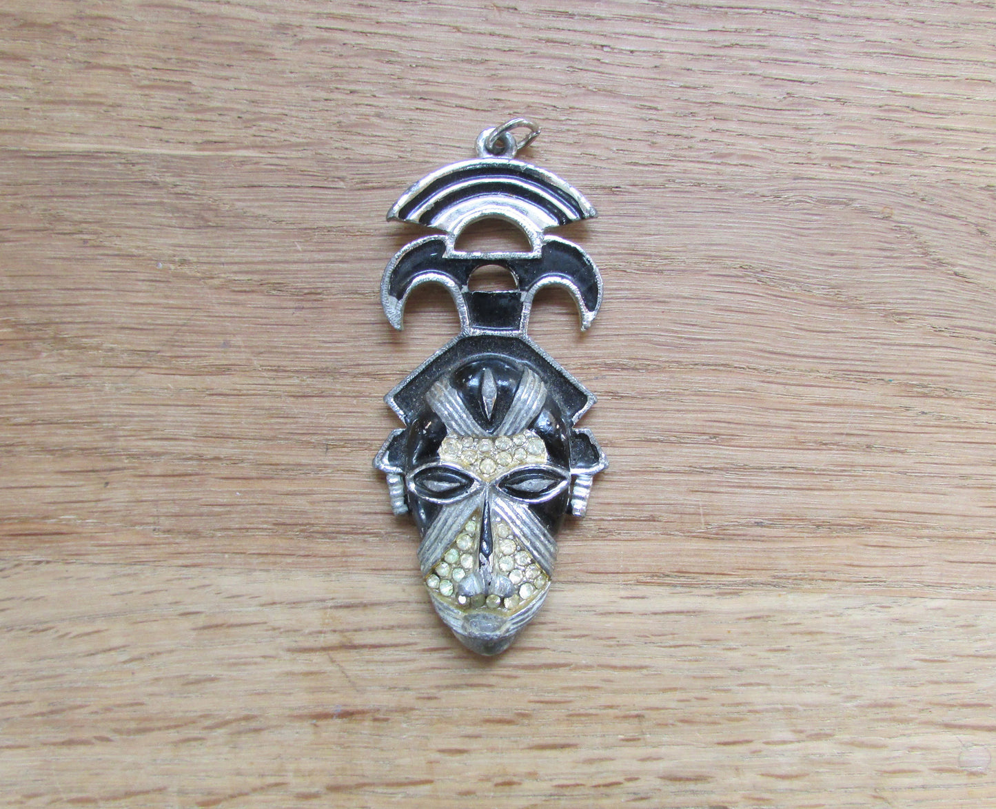 Art Deco silver-tone & black enamel tribal head pendant with diamanté detail