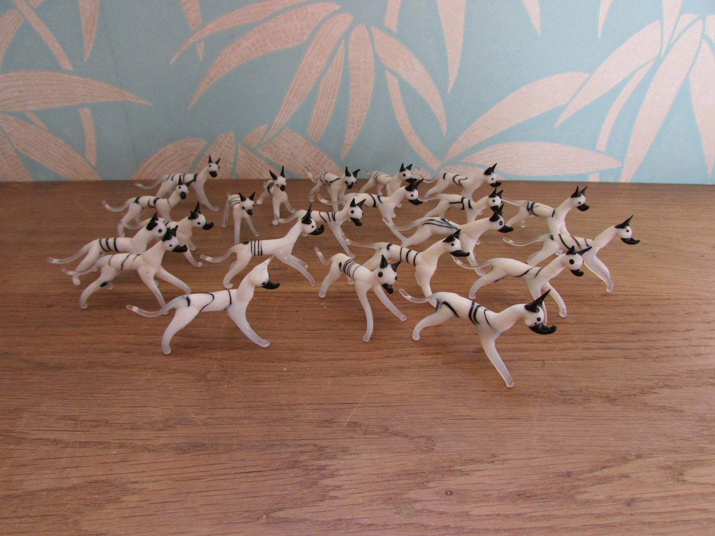 Vintage small blown glass black & white hound figurine