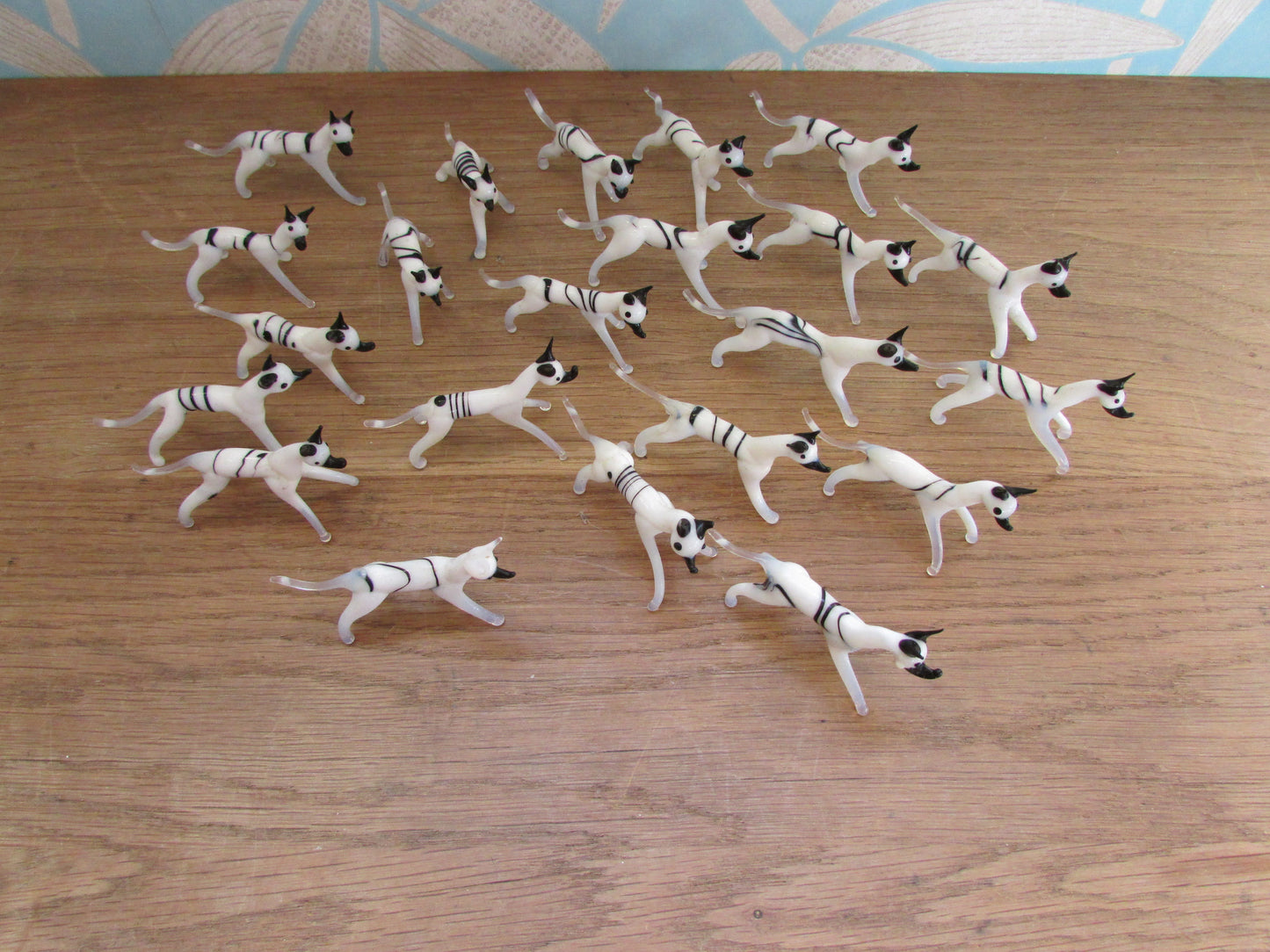 Vintage small blown glass black & white hound figurine