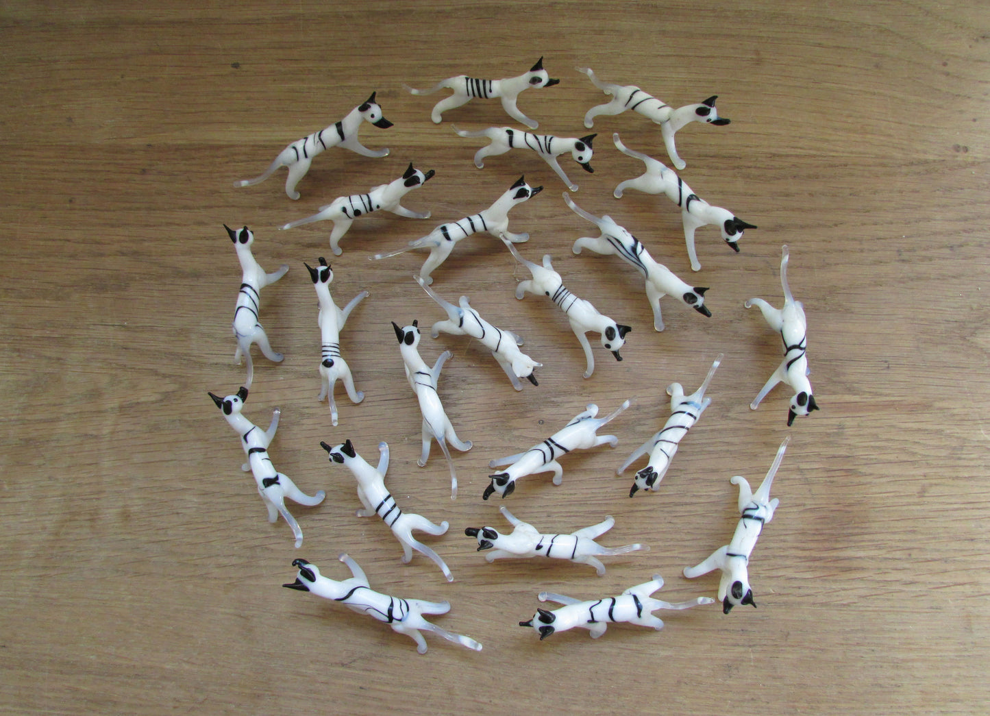 Vintage small blown glass black & white hound figurine