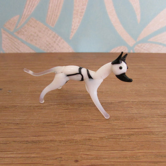 Vintage small blown glass black & white hound figurine