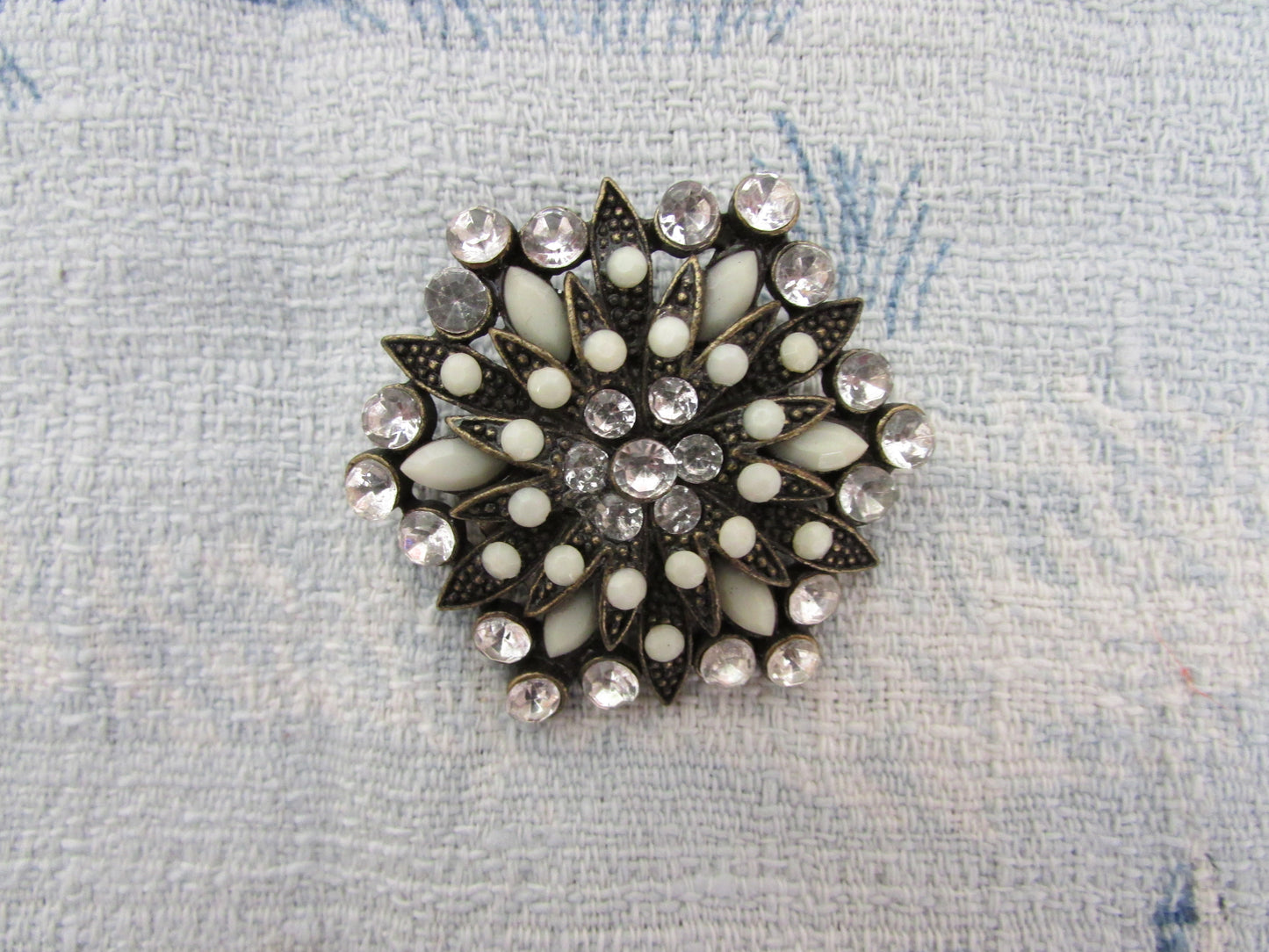 Vintage milk glass & rhinestone circle brooch