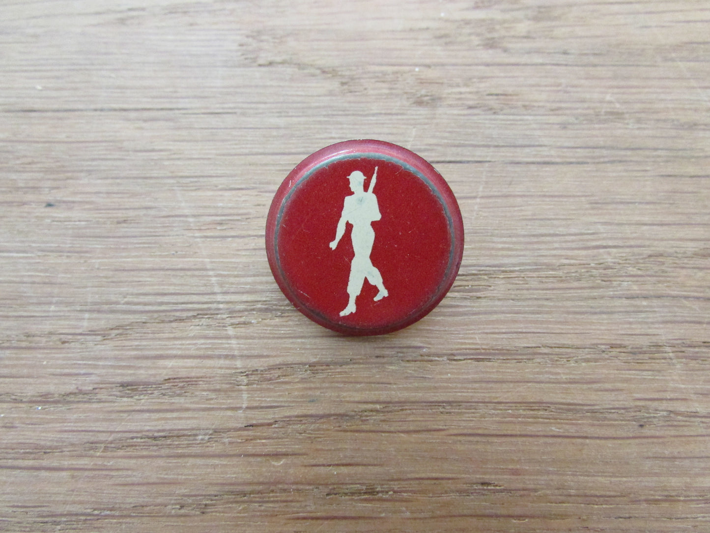Home-made pin brooch using vintage tin game pieces/counters