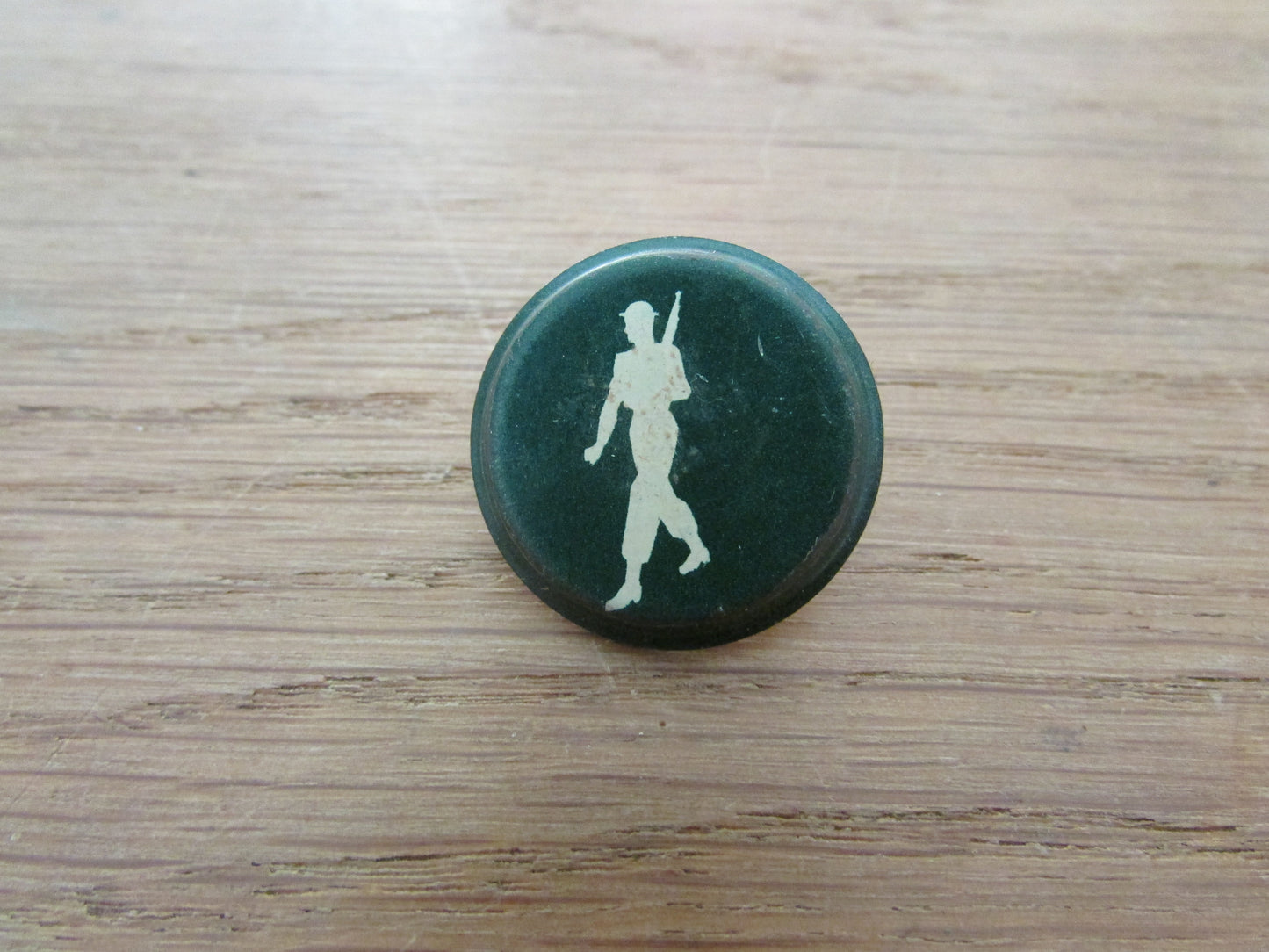 Home-made pin brooch using vintage tin game pieces/counters