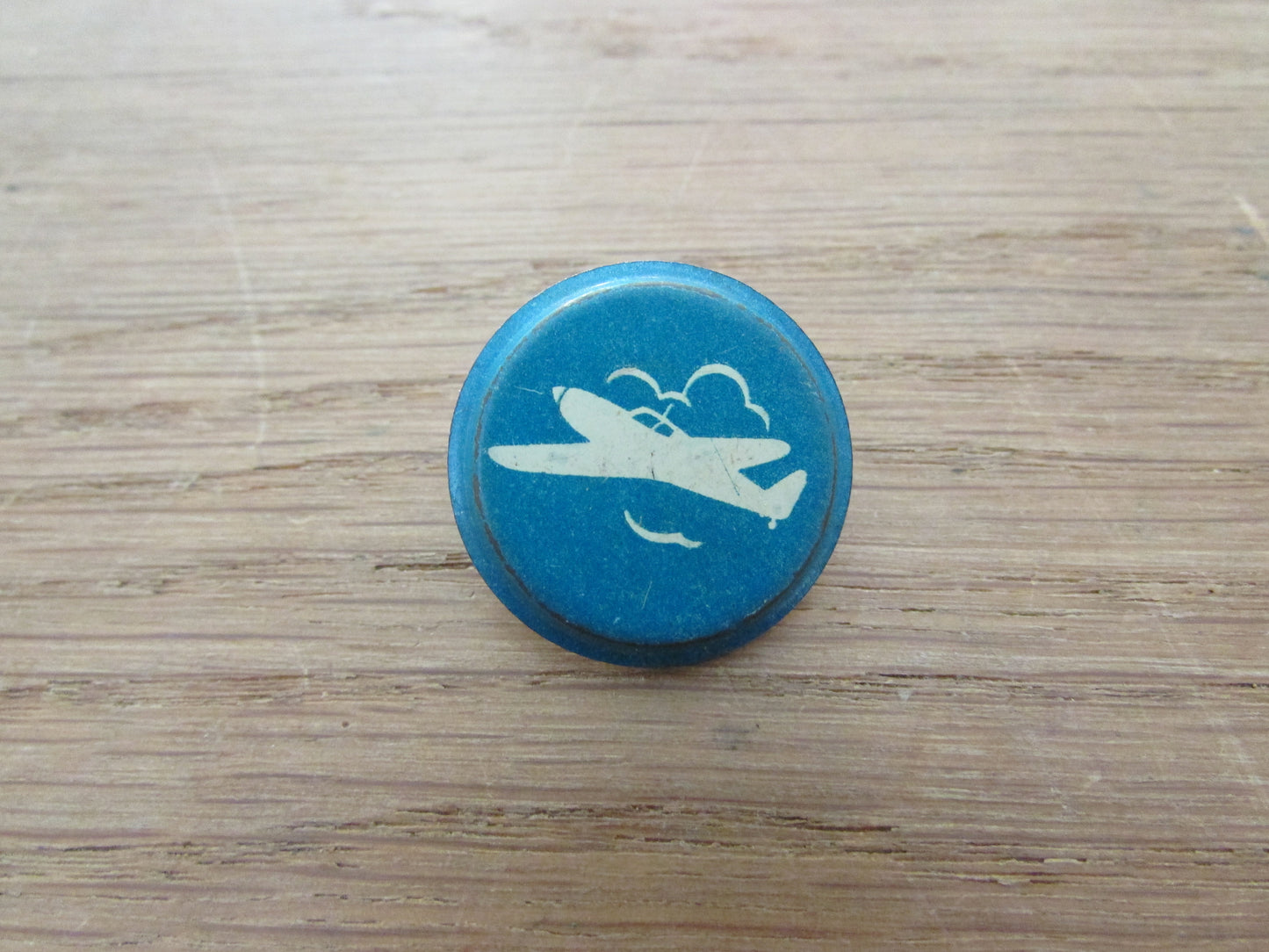 Home-made pin brooch using vintage tin game pieces/counters