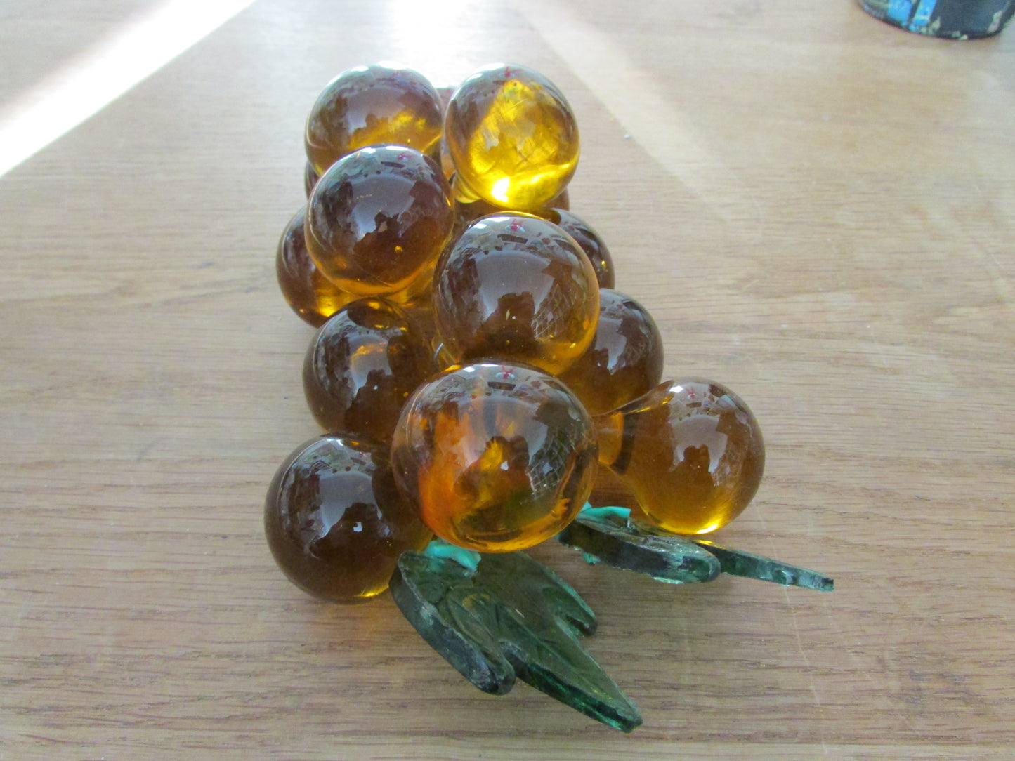 Mid-century Murano-style amber glass large grape cluster with green glass leaves