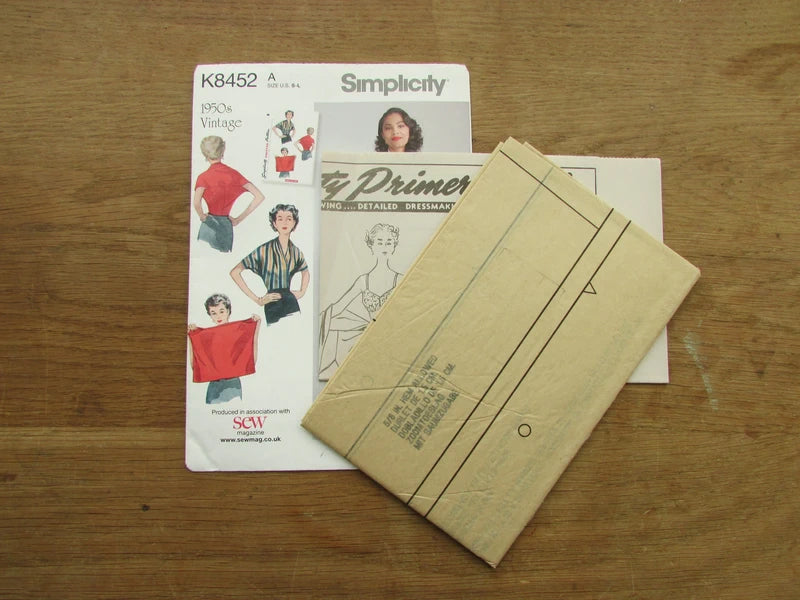Uncut 2017 Simplicity K8452 sewing pattern for 1950s misses' knit blouse, sizes 6-18 (complete)