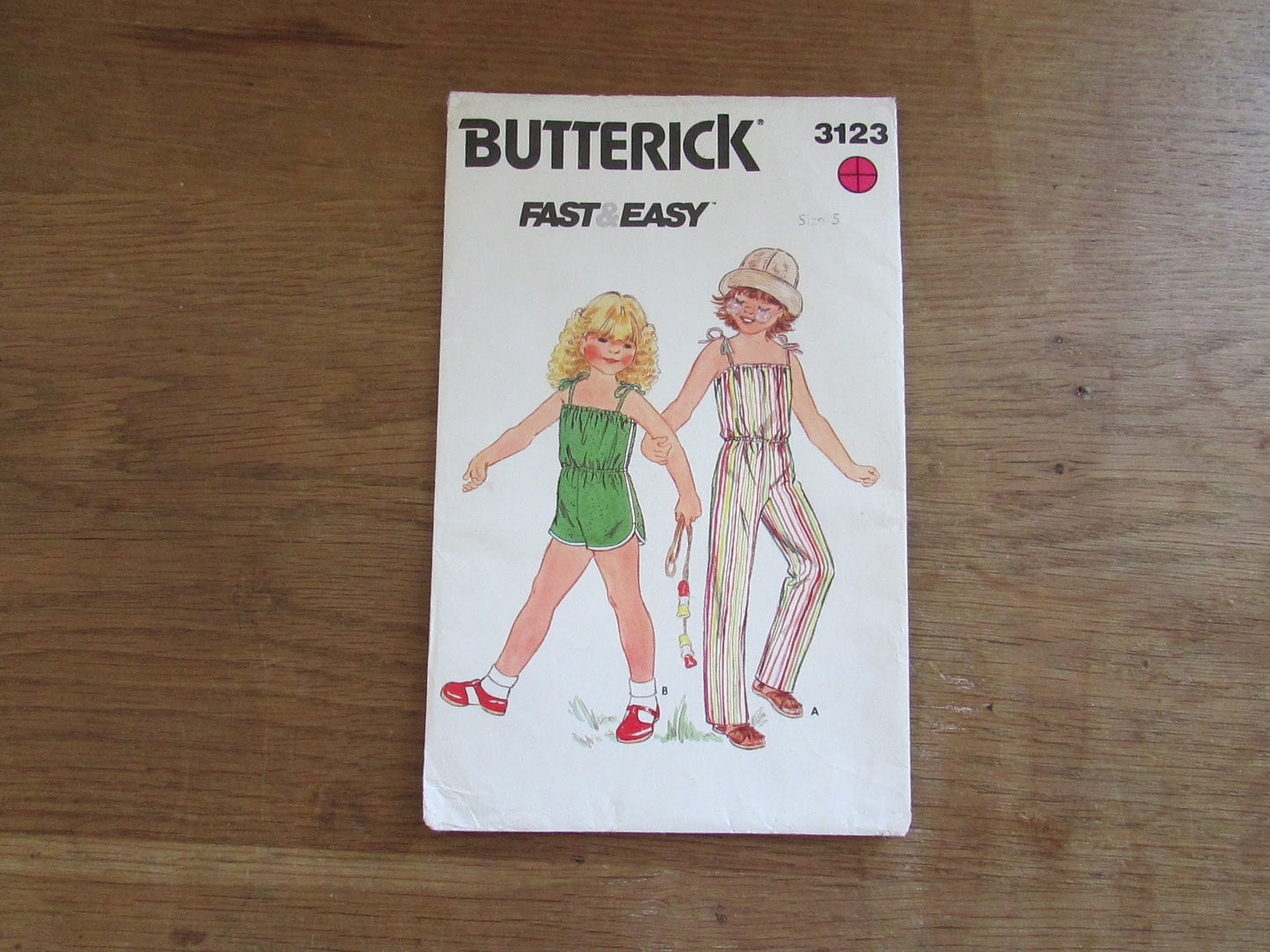 Uncut 1970s Butterick 3123 sewing pattern for children's jumpsuit, size S (complete)