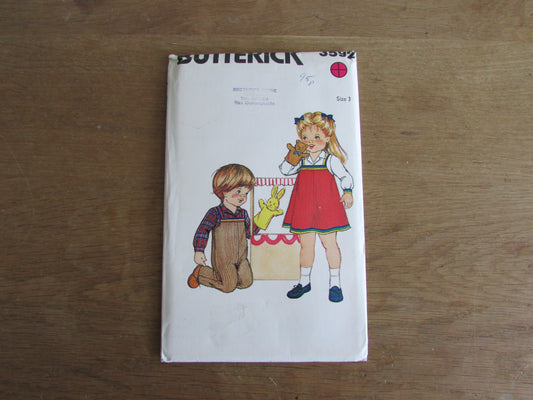 Uncut vintage Butterick 3592 sewing pattern for toddlers' overalls, jumper & skirt, size 3 (complete)