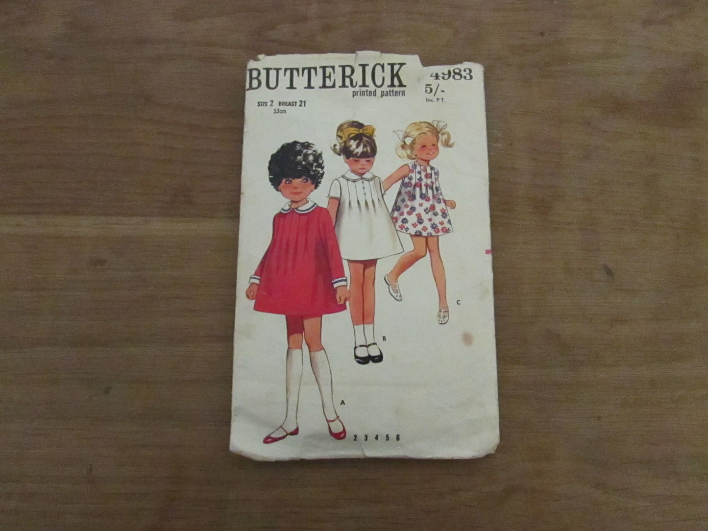 Used 1969 Butterick 4983 sewing pattern for children's one-piece dress, size 2 (complete, missing instructions)