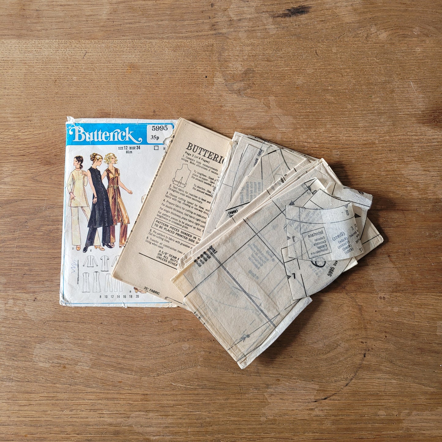 Part cut 1970 Butterick 5995 sewing pattern for misses' one-piece evening dress & pants, size 12 (complete)