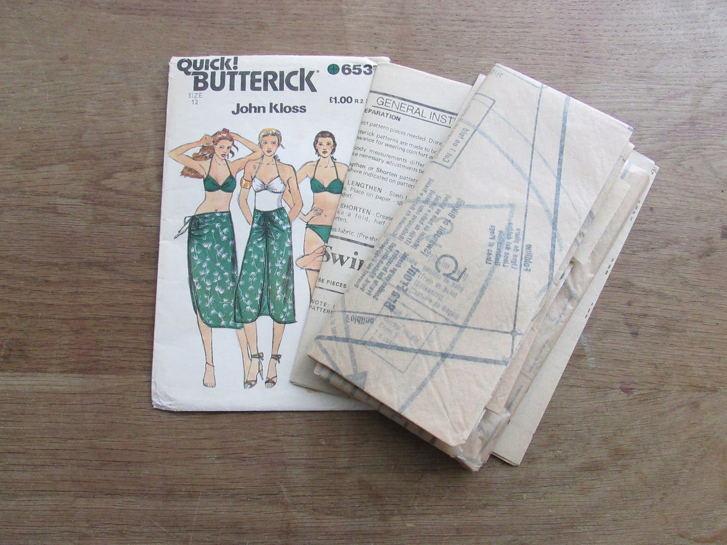 Uncut 1980 Butterick 6537 sewing pattern by John Kloss for misses' swimsuit, bikini & skirt, size 12 (complete)