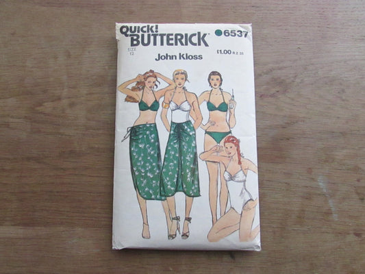 Uncut 1980 Butterick 6537 sewing pattern by John Kloss for misses' swimsuit, bikini & skirt, size 12 (complete)