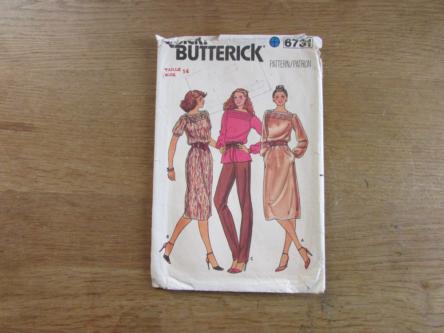 Part cut 1980s Butterick 6731 sewing pattern for misses' dress, top & pants, size 14 (complete)