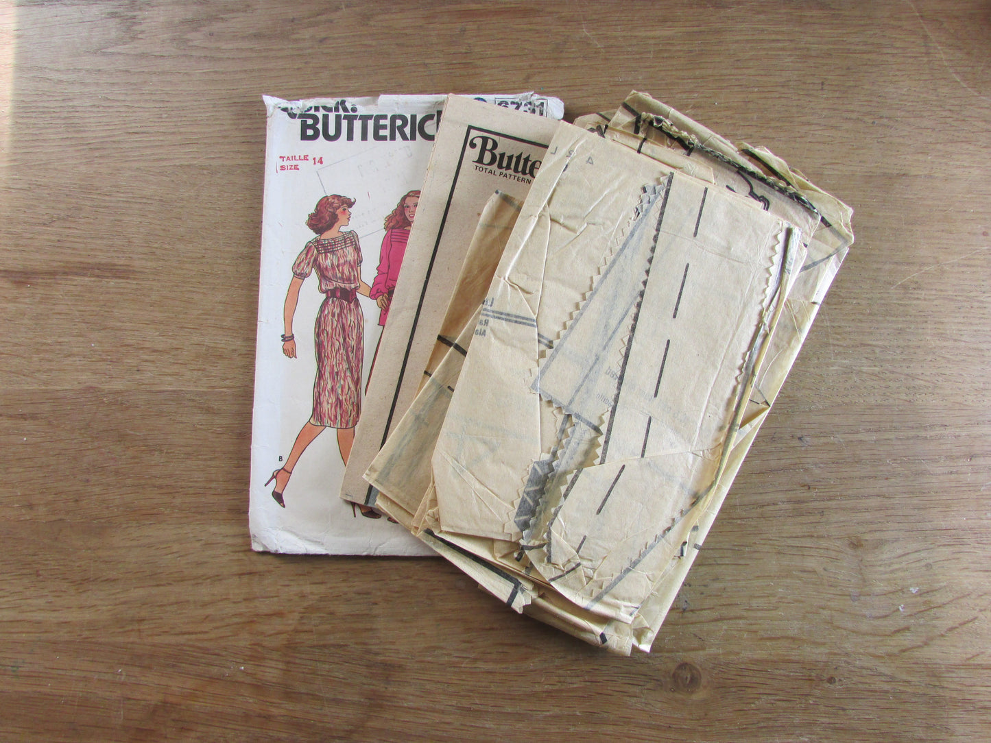 Part cut 1980s Butterick 6731 sewing pattern for misses' dress, top & pants, size 14 (complete)