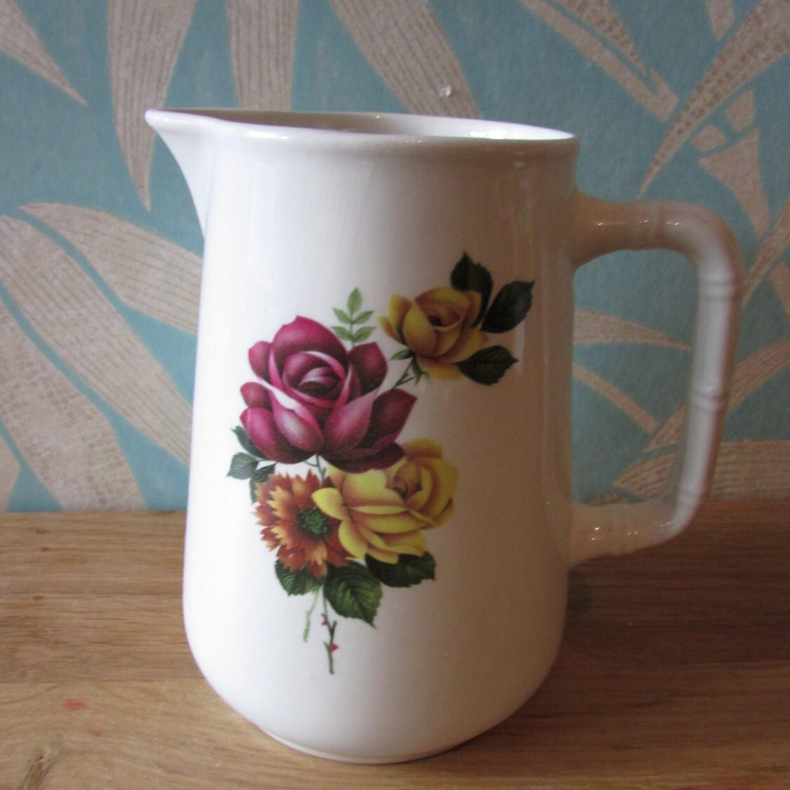 Vintage Sampson Bridgwood floral patterned milk jug, bamboo design detail on handle