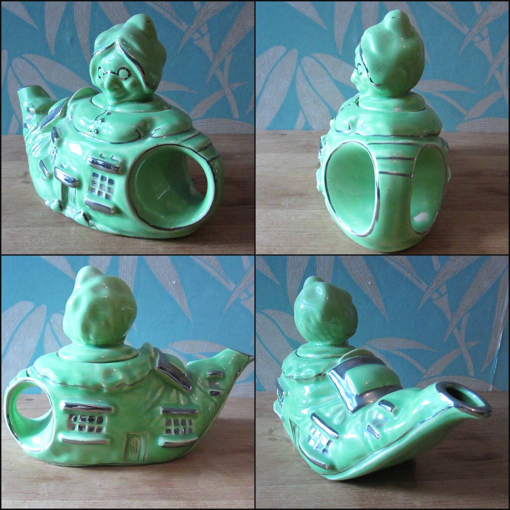1930s Lingard "Old woman who lived in a shoe" novelty green teapot, silver-finish highlights
