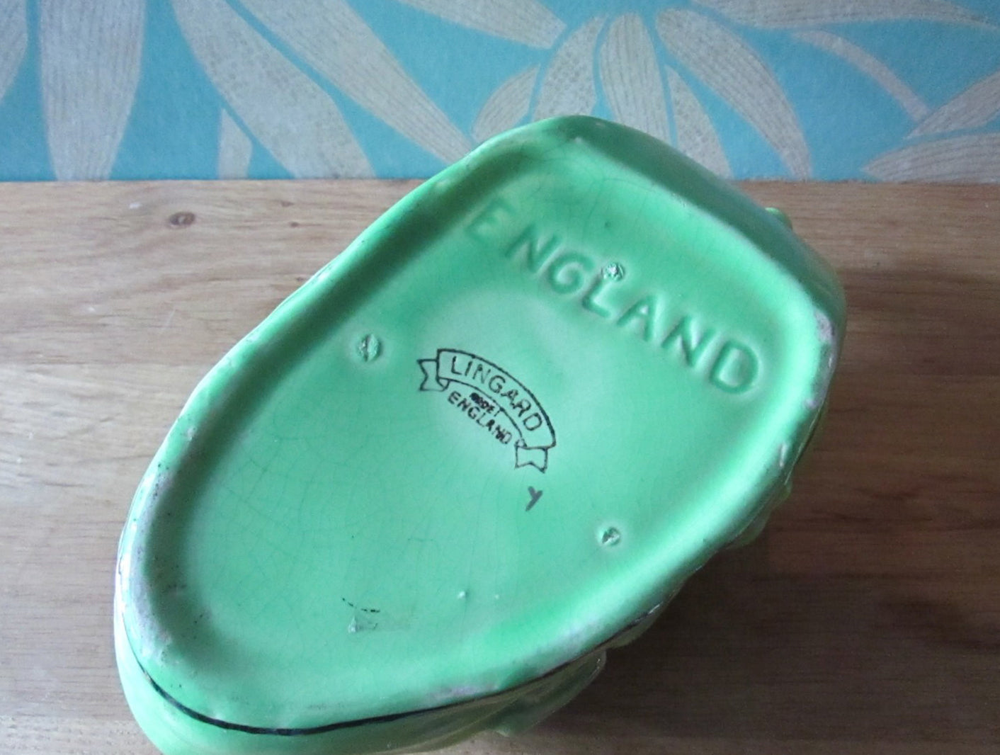 1930s Lingard "Old woman who lived in a shoe" novelty green teapot, silver-finish highlights