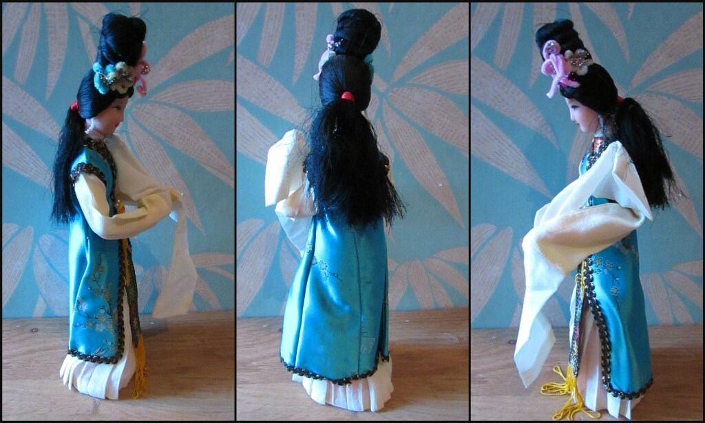 Vintage traditional-costume Chinese pose doll