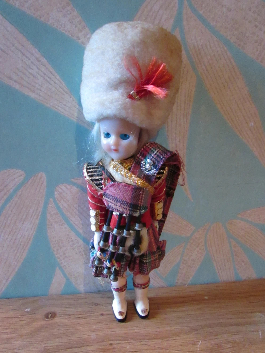 Vintage Scotsman celluloid souvenir doll with open/close eyes, "Empire Made"