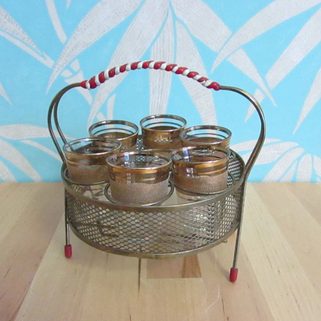 1950s/60s wire shot glass holder with six gold-banded shot glasses