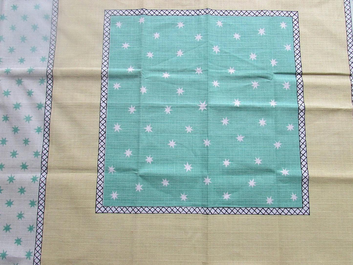 Vintage white, lemon yellow, & peppermint green tablecloth with contrast star motif