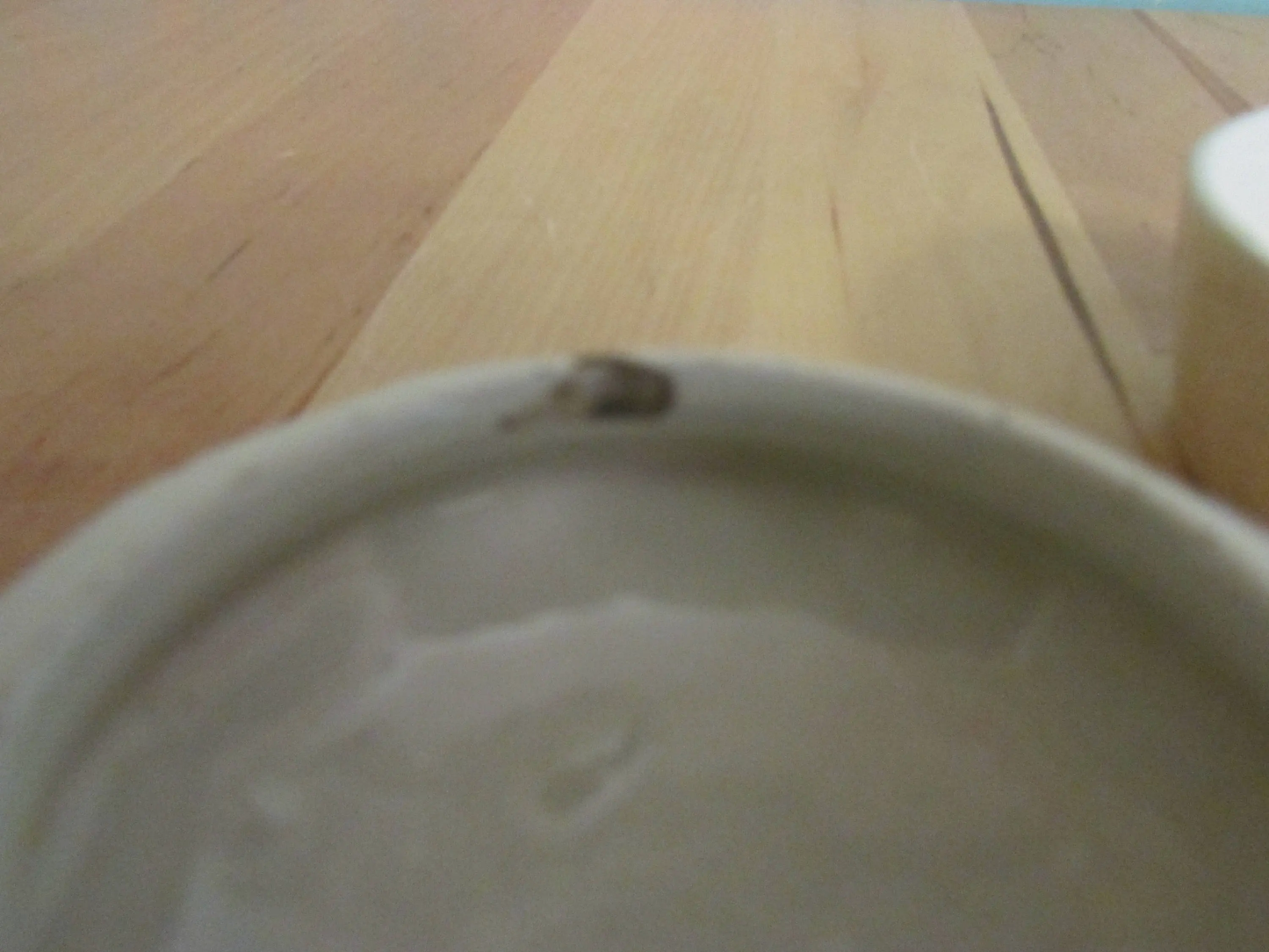 Vintage gilt edged porcelain powder jar with nursery scene transfer detail