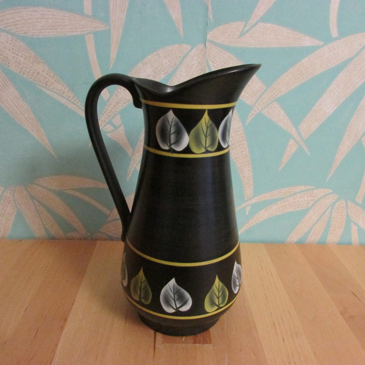 Vintage Ranleigh Ware Ercall black ceramic hand-painted pitcher/jug with contrast colour leaf print