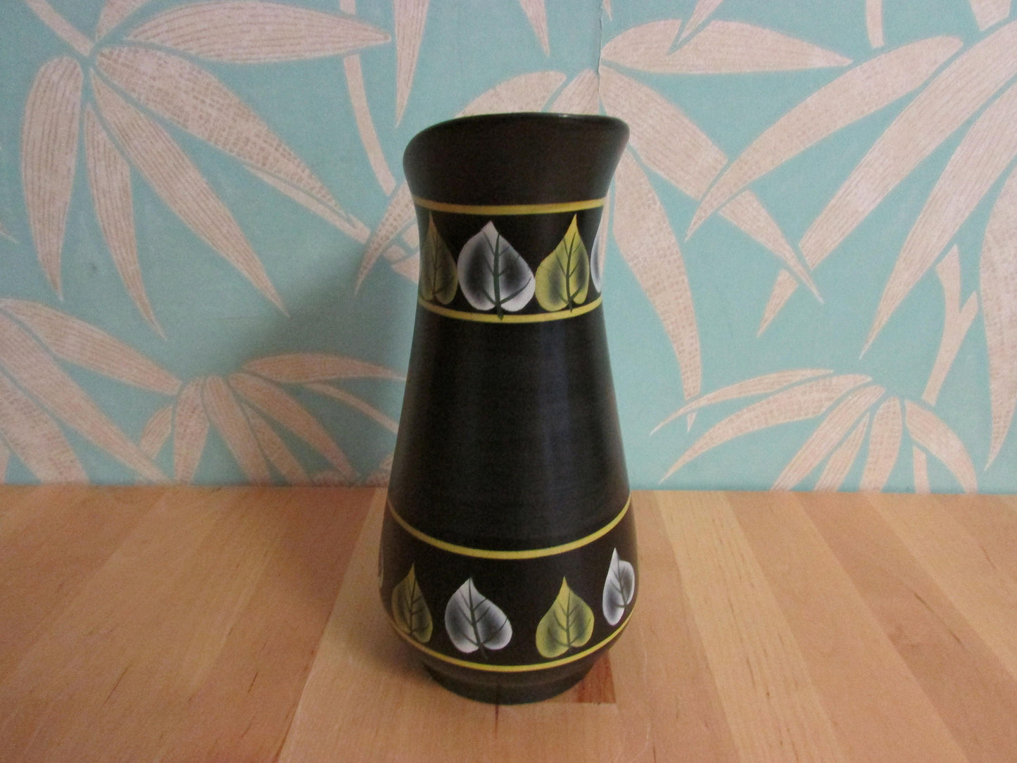 Vintage Ranleigh Ware Ercall black ceramic hand-painted pitcher/jug with contrast colour leaf print