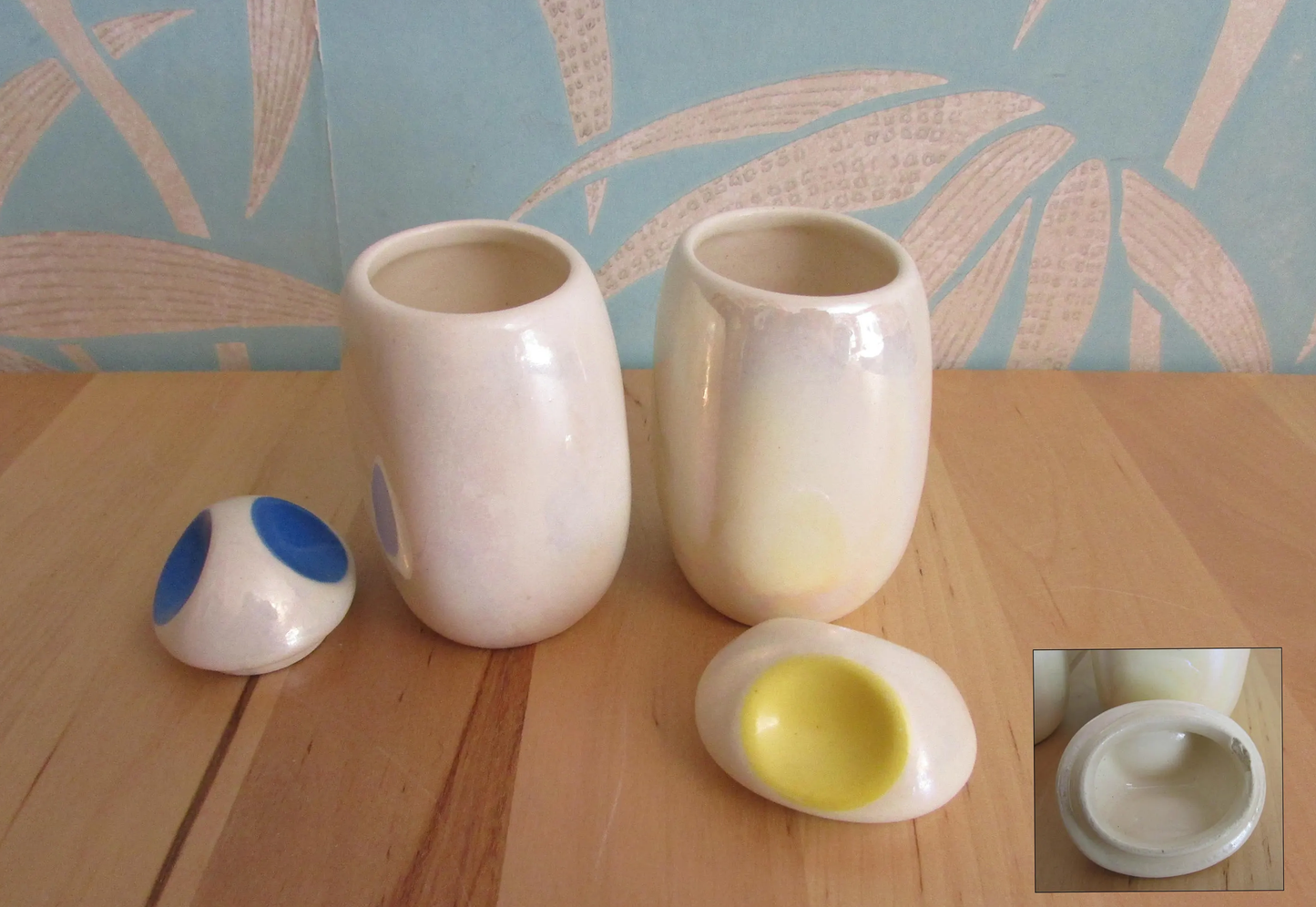 Three mid-century Romanian lustred ceramic storage caddies with contrast colour 'pinched' lids