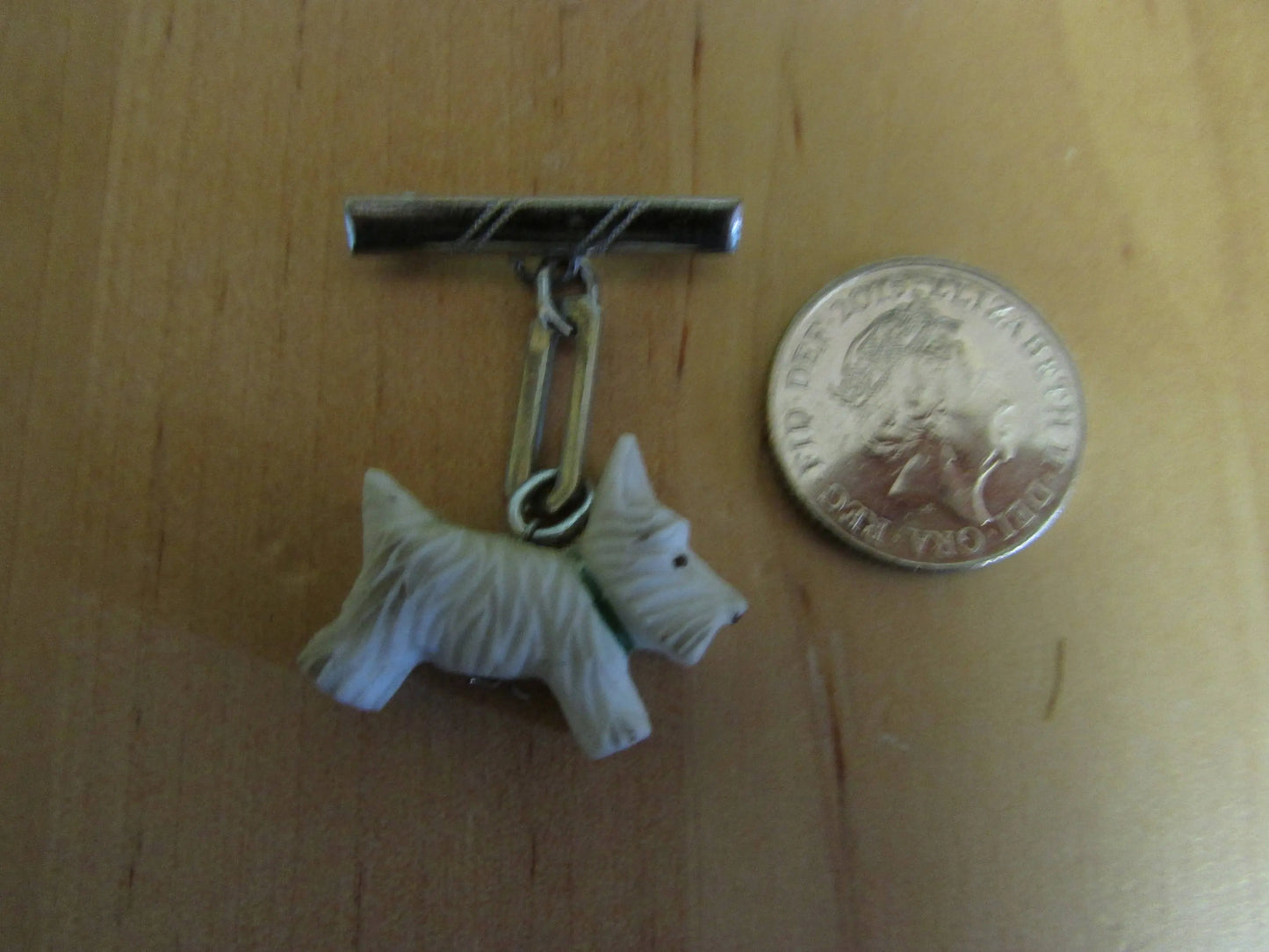 Art Deco silver-tone bar drop brooch with white celluloid Scottie dog