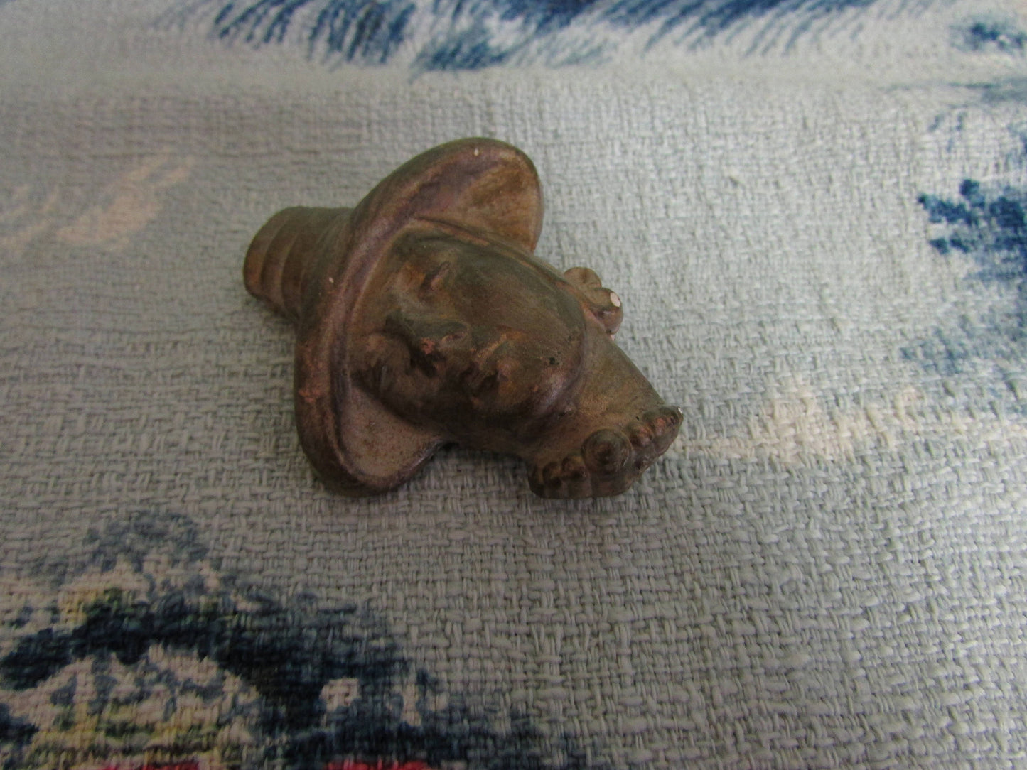 Vintage gold-painted plaster/chalkware lady in hat head brooch