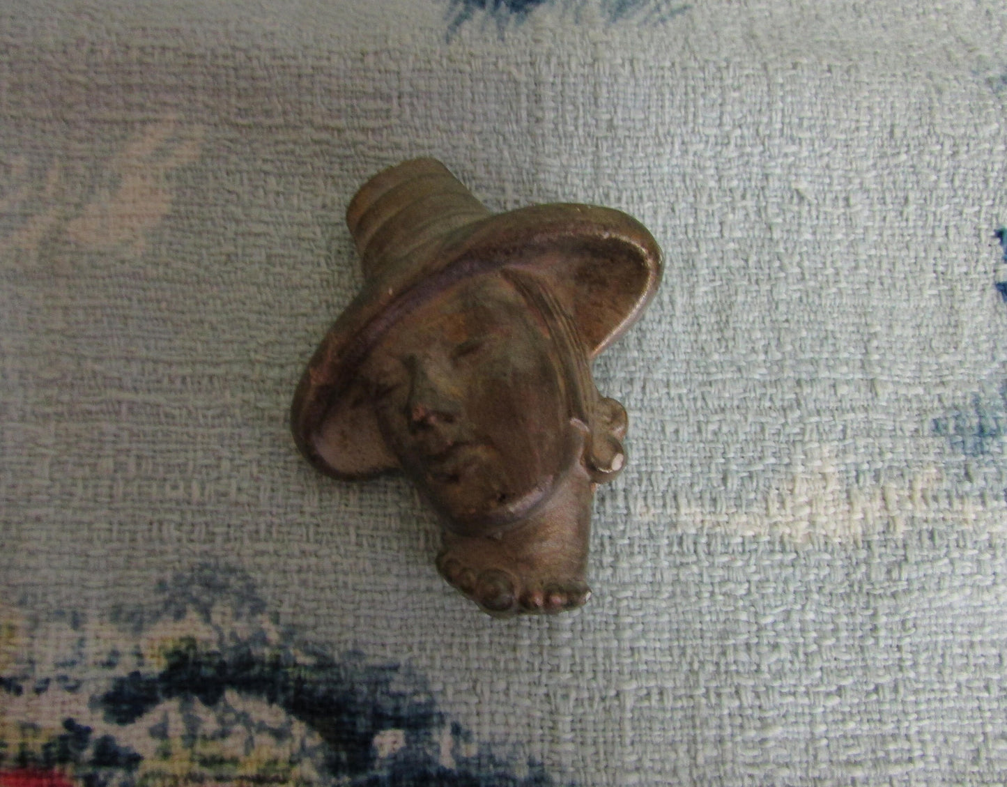 Vintage gold-painted plaster/chalkware lady in hat head brooch
