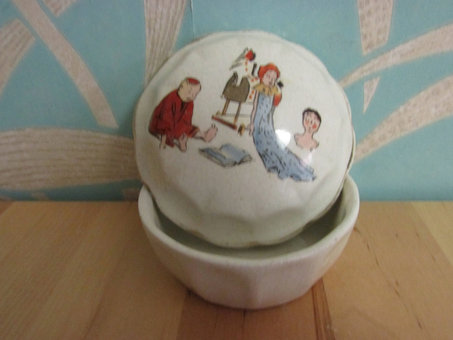 Vintage gilt edged porcelain powder jar with nursery scene transfer detail