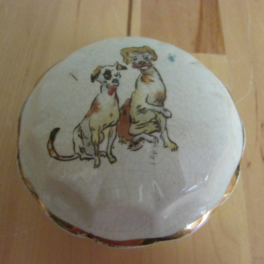 Vintage gilt edged porcelain powder jar with two dogs transfer detail